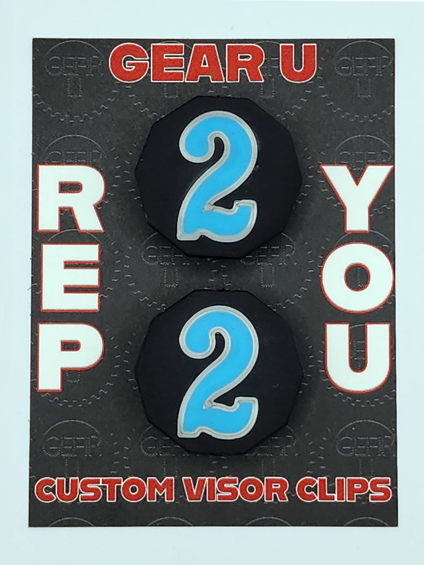 Black clips, light blue number 2, silver outline