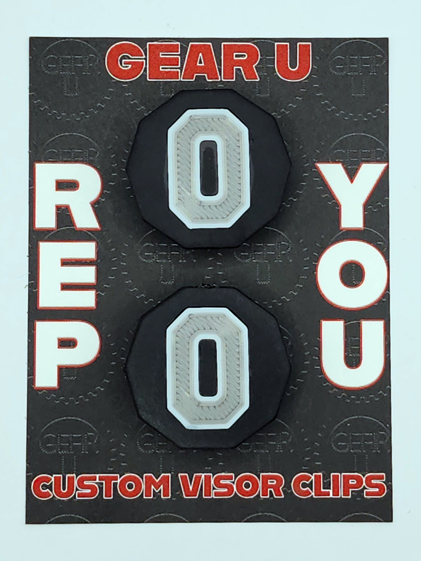 Black clips, silver number 0, white outline