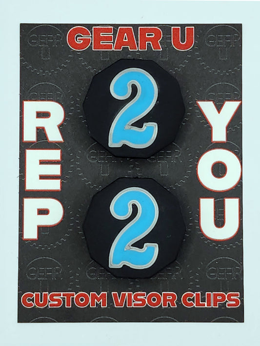 Black clips, light blue number 2, silver outline